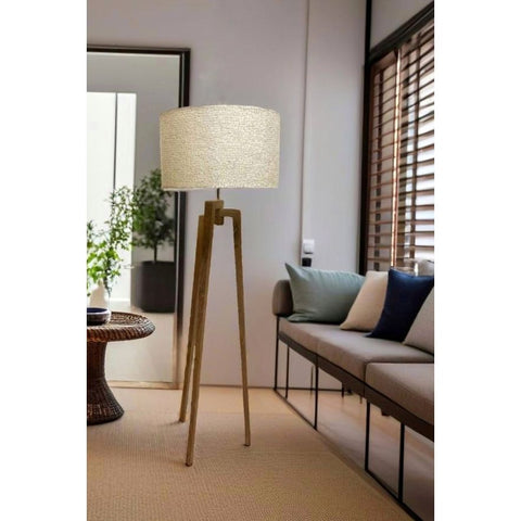 Chic white shell floor lamp with teak wooden stand.