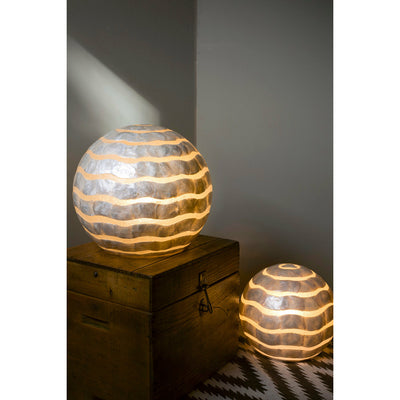 Mares globe lamps made with white oyster shells. Coastal lighting by Collectiviste UK.