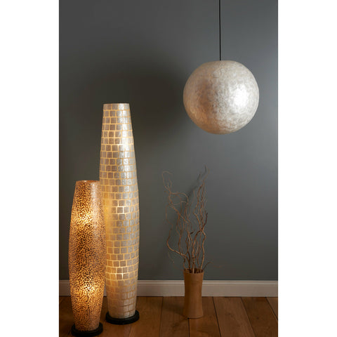Unique lighting design - tall lamps and large lampshade all handmade from mother of pearl. Lighting by Collectiviste.