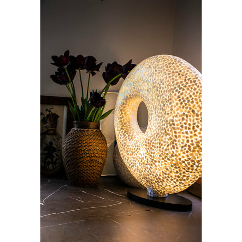 Unique accent lighting. White table lamp in unusual torus shape decorated with mother of pearl fragments by Collectiviste UK