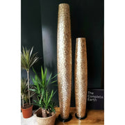 Very tall gold floor lamps handcrafted from oyster shells. Pebble lighting collection by Collectiviste UK.