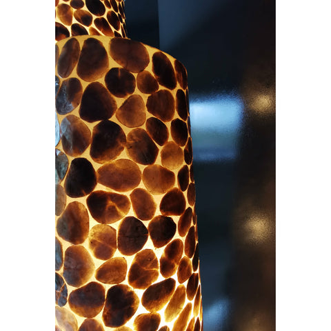 Close up of golden capiz shells on Pebble lighting collection by Collectiviste UK.