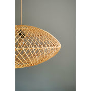 Close up of natural ovo rattan shade. Woven light fixtures by collectiviste.com
