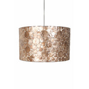 Cylinder light shade with decorative gold coin design against white background by Collectiviste lighting. 