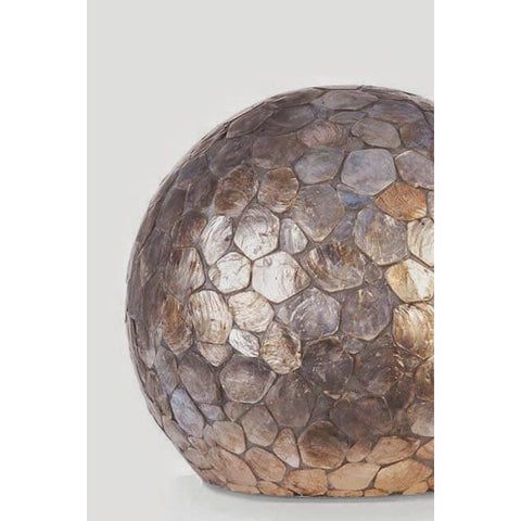 Round table lamp crafted with golden shells. Pebble by Collectiviste lighting UK.