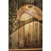 Vintage rattan lampshade style with enchanting shadows. Rattan lighting by Collectiviste.