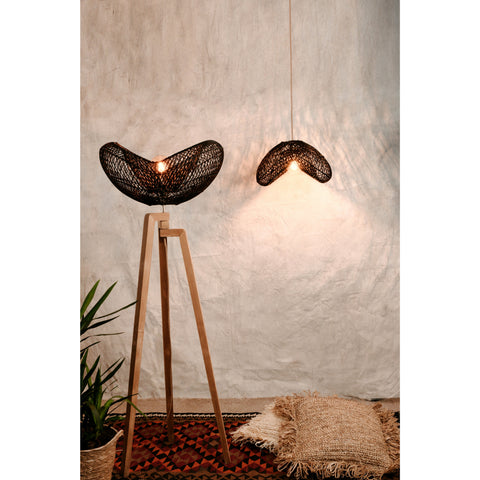 Black rattan lampshade and wooden tripod floor lamps.