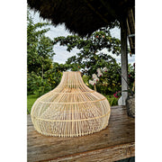 Patio styling with rattan lampshade by Collectiviste lighting.