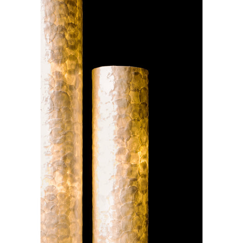 Amroth cylinder floor lamps in the dark by Collectiviste. Unique home lighting collection handcrafted with white oyster shells.