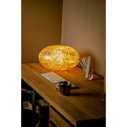 Unusual desk lamp handcrafted from golden mother of pearl. Table Lighting by Collectiviste.