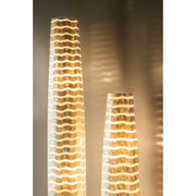 White shell floor lamps with wave design. Mares by Collectiviste.