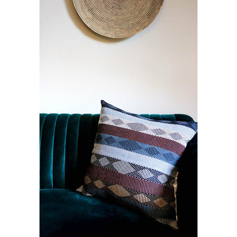 Luxury Cushion in red, blue and yellow, handwoven in Colombia. Rombo Red by Collectiviste home decor.