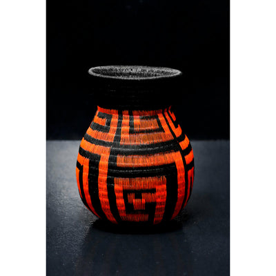 Small Werregue Basket with orange tribal design.